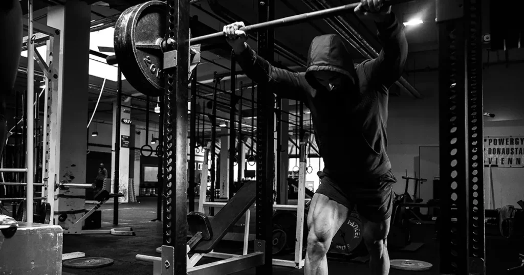 Man doing strength training in a gym